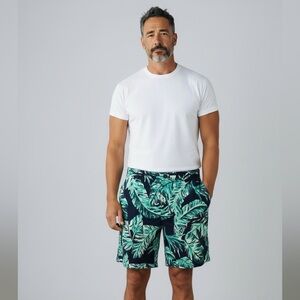 Under Armour Storm Drive Men’s size 32 Tropical themed golf shorts.